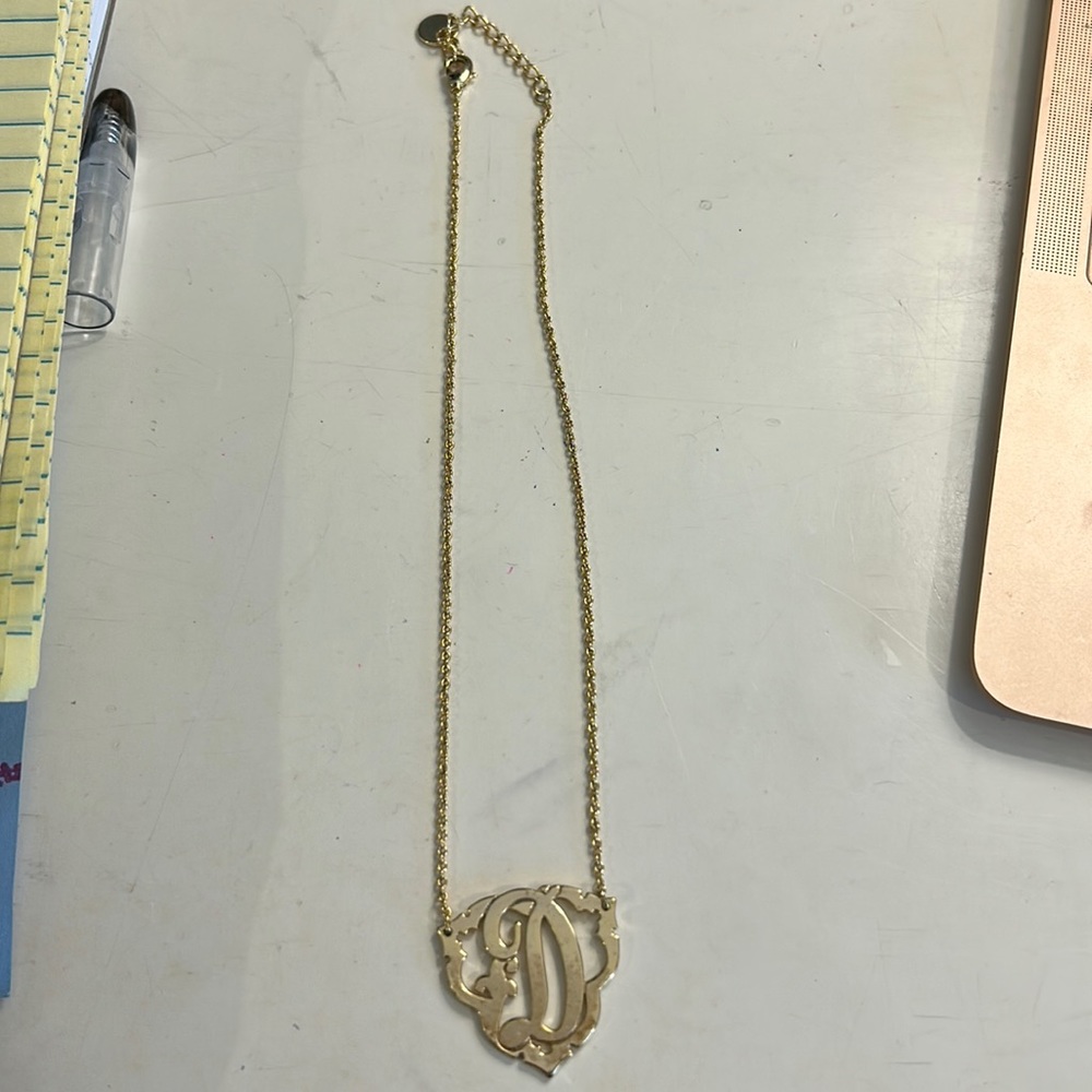 C wonder. Faux gold. D necklace